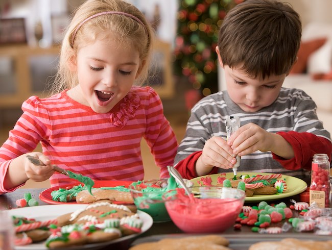 kids decorating holiday cookies
